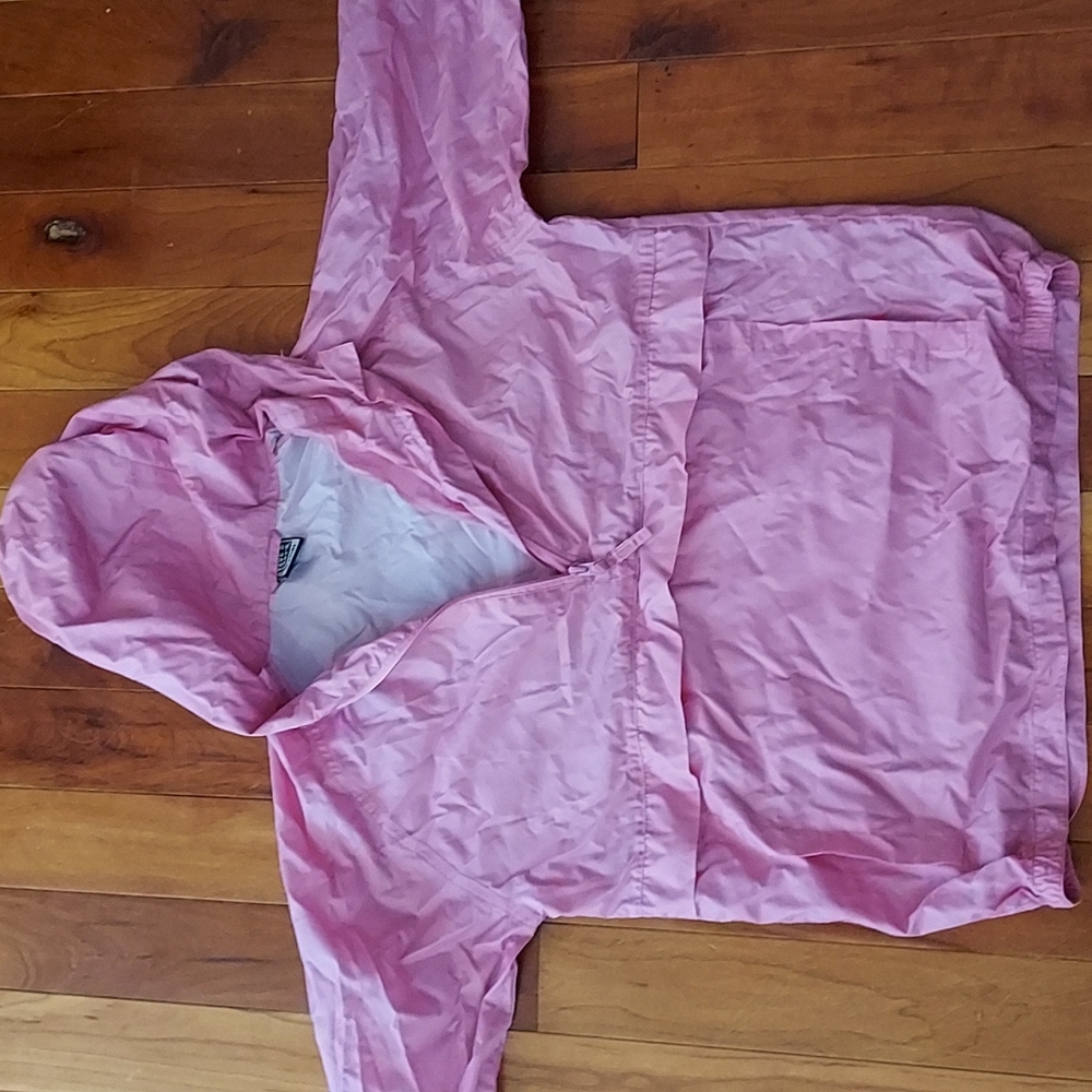 Rain coat with secret puch in front for phone and to store rain coat